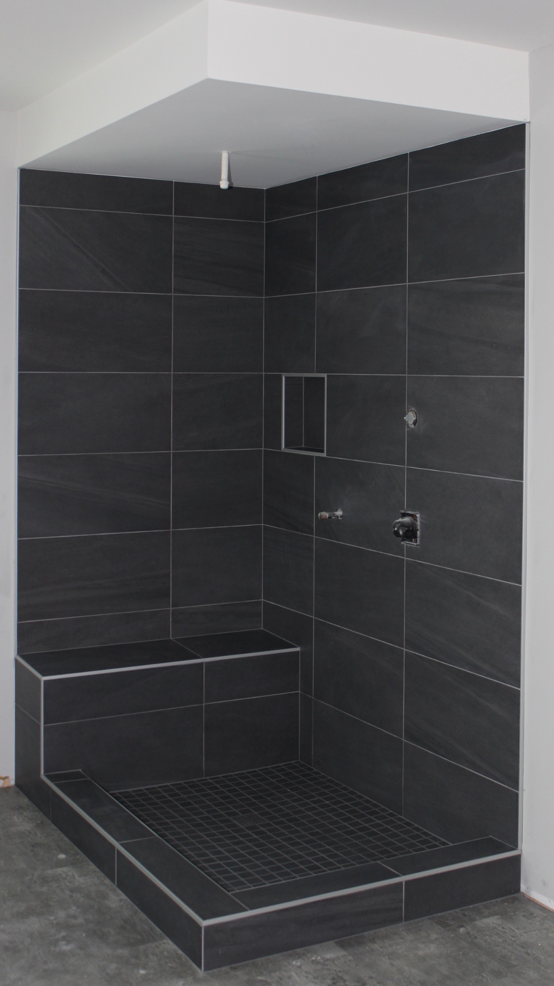 Dark Large Format Tile – Built-in Bench