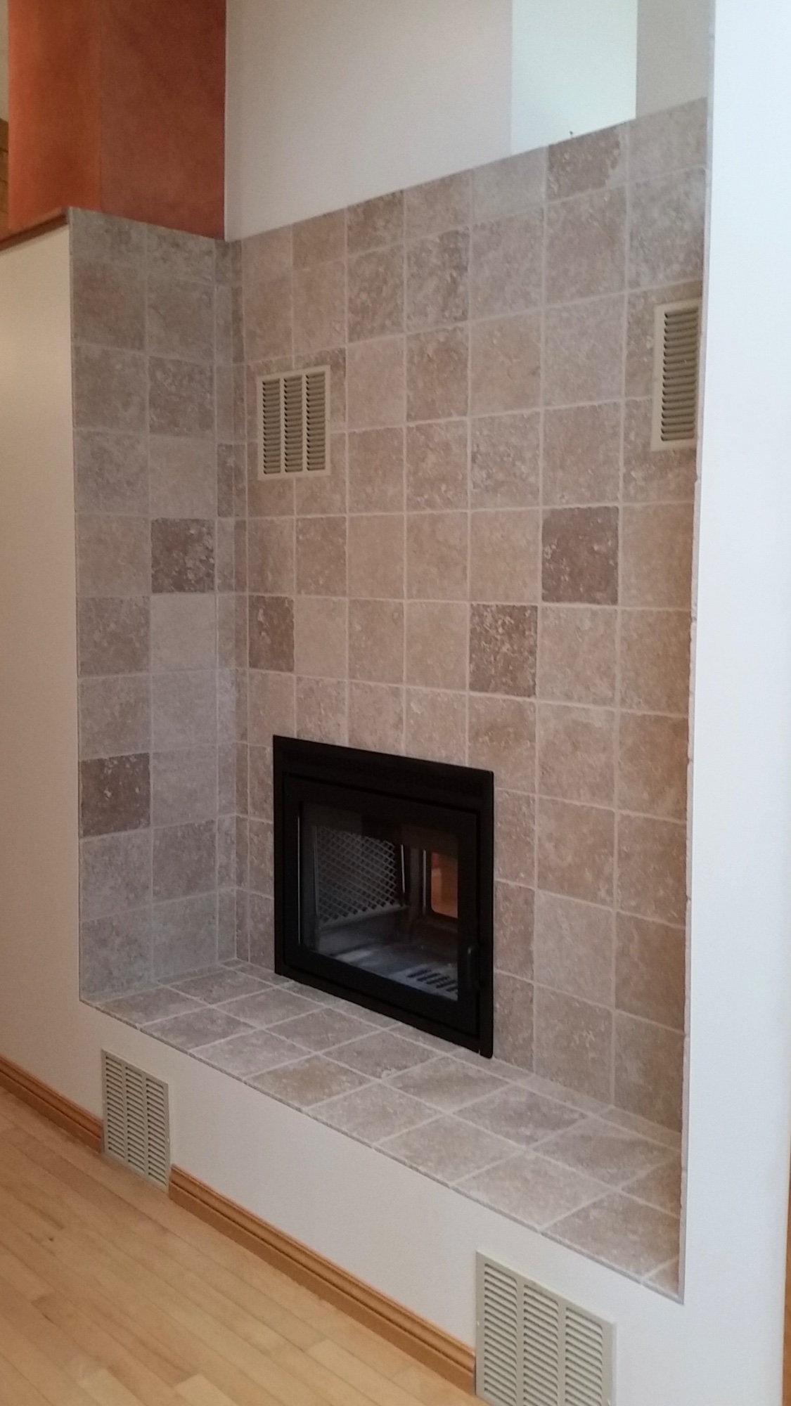 Travertine tile fireplace surround