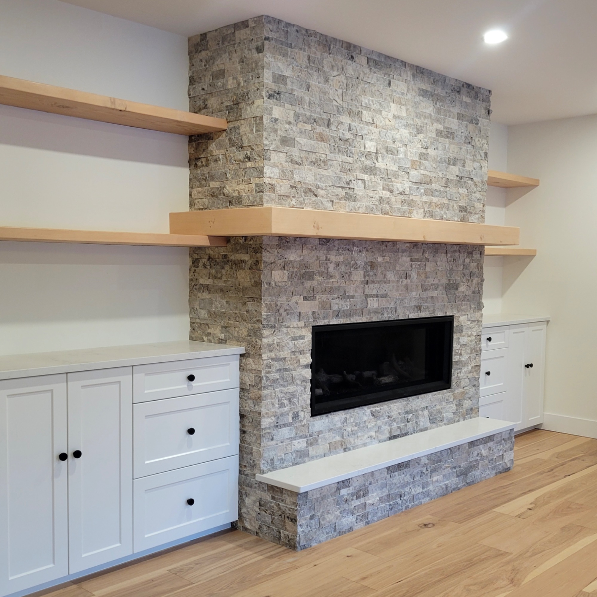 Stacked Stone Fireplace – Built-in Shelving